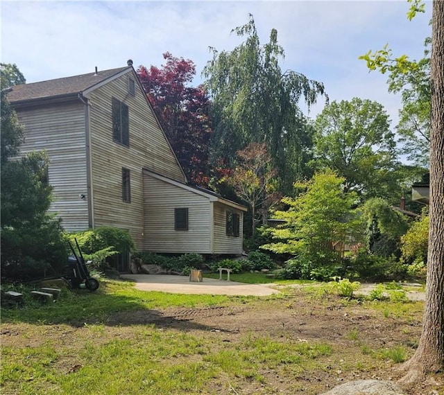 66 Shadbush Rd, South Kingstown, RI 02879 - view of side of property with a patio area