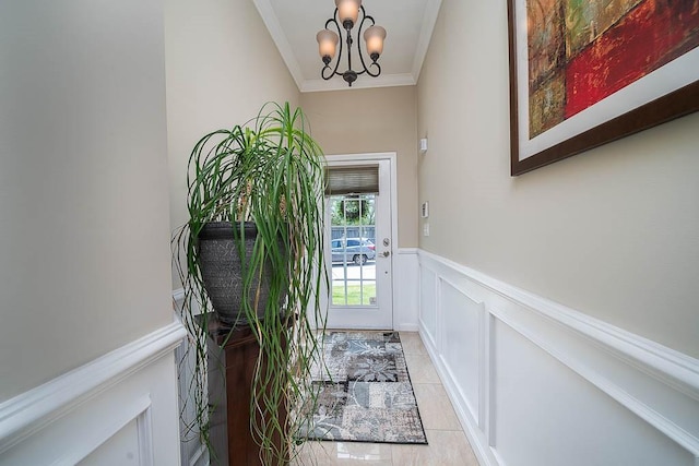 1421 Douglas Ave Unit E, North Providence, RI 02904 - foyer entrance with crown molding, a chandelier, wainscoting, a decorative wall, and light tile patterned floors