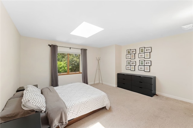336 Switch Rd, Richmond, RI 02832 - carpeted bedroom featuring a skylight and baseboards