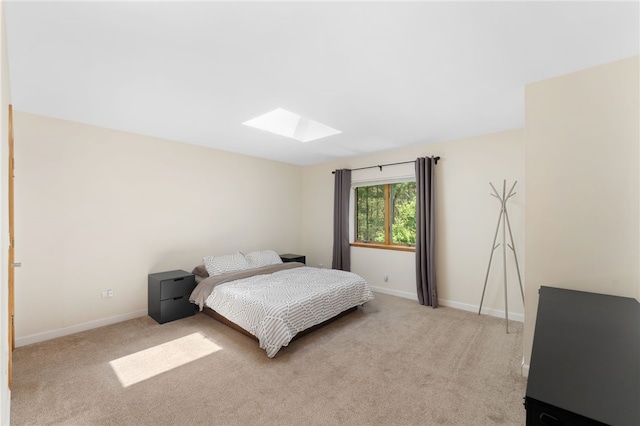 336 Switch Rd, Richmond, RI 02832 - bedroom featuring a skylight, light colored carpet, and baseboards