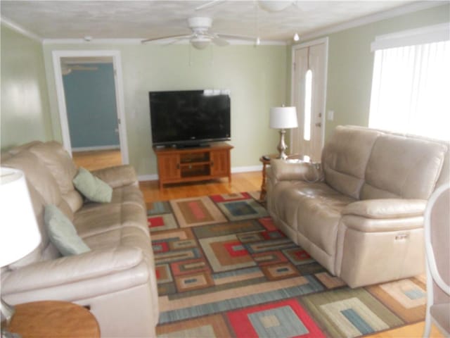 20 Anchorage Rd, Narragansett, RI 02882 - living room featuring a ceiling fan and crown molding