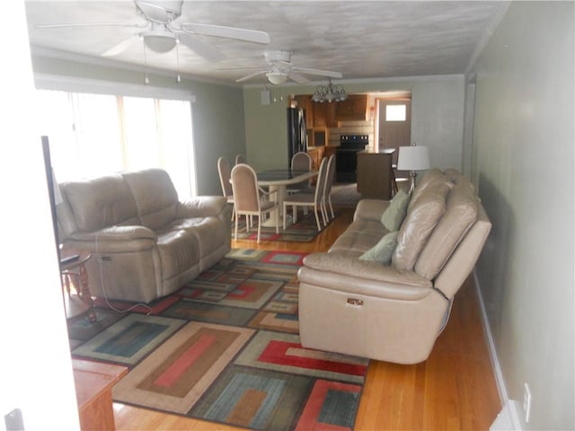 20 Anchorage Rd, Narragansett, RI 02882 - living area featuring a ceiling fan, crown molding, and wood finished floors