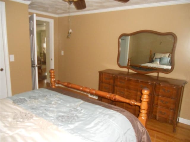 20 Anchorage Rd, Narragansett, RI 02882 - bedroom with wood finished floors and crown molding