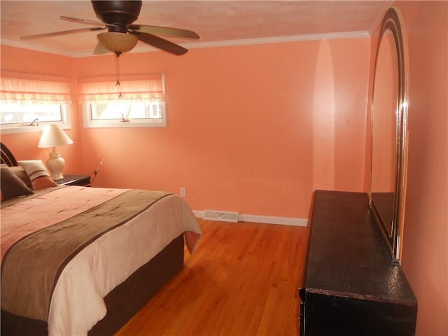 20 Anchorage Rd, Narragansett, RI 02882 - bedroom with wood finished floors, crown molding, baseboards, and ceiling fan