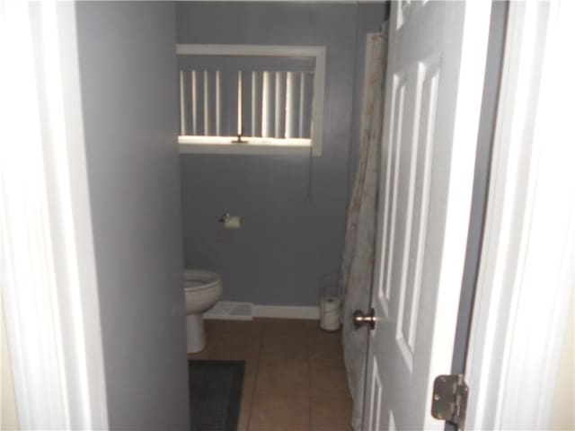 20 Anchorage Rd, Narragansett, RI 02882 - bathroom featuring toilet, tile patterned floors, and baseboards