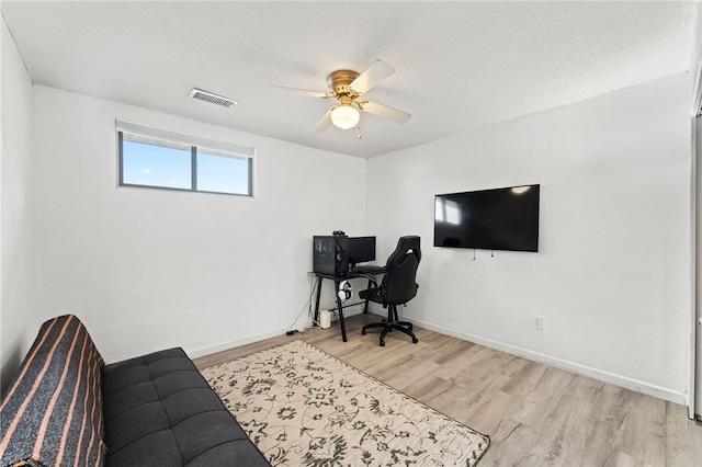 694 Orleans Ct, Warwick, RI 02886 - home office with light wood-type flooring, a ceiling fan, and baseboards