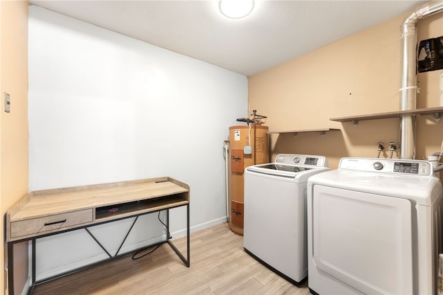 694 Orleans Ct, Warwick, RI 02886 - laundry room with water heater, light wood-type flooring, and independent washer and dryer
