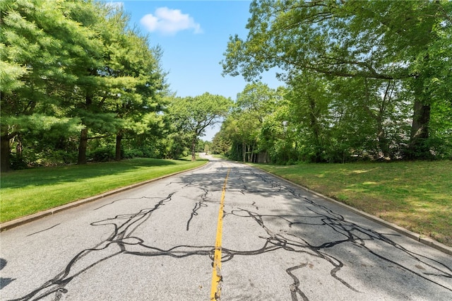 694 Orleans Ct, Warwick, RI 02886 - view of asphalt street featuring curbs