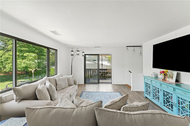 694 Orleans Ct, Warwick, RI 02886 - living room featuring wood finished floors and baseboards