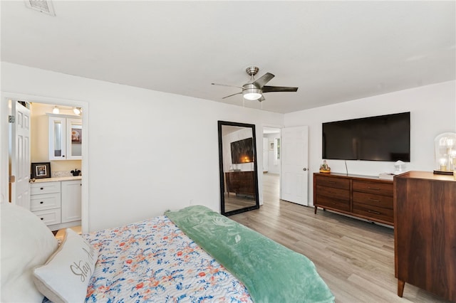694 Orleans Ct, Warwick, RI 02886 - bedroom with light wood-style floors and ceiling fan