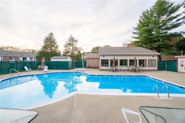752 Quaker Ln Unit C311, Warwick, RI 02818 - community pool with a patio area