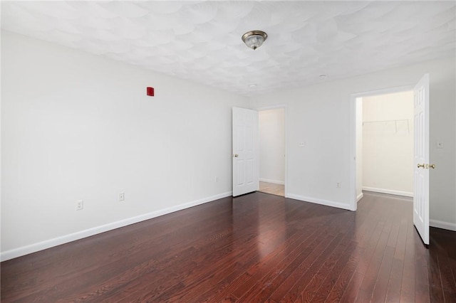 752 Quaker Ln Unit C311, Warwick, RI 02818 - unfurnished room with dark wood finished floors and baseboards