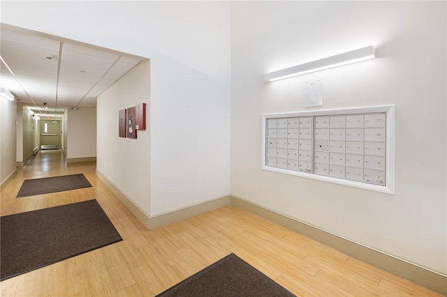 752 Quaker Ln Unit C311, Warwick, RI 02818 - corridor with wood finished floors and mail area