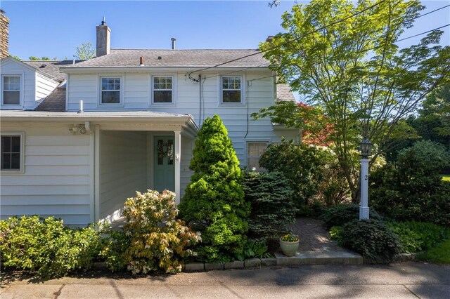 2 Cherry Ln, Bristol, RI 02809 - rear view of property with a chimney and a shingled roof