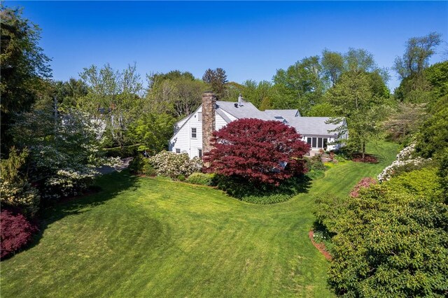 2 Cherry Ln, Bristol, RI 02809 - view of home's exterior featuring a yard and a chimney
