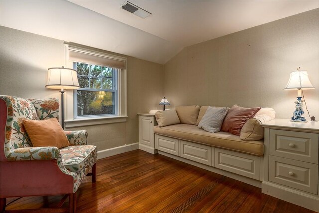 2 Cherry Ln, Bristol, RI 02809 - sitting room with dark wood-style floors, vaulted ceiling, and baseboards