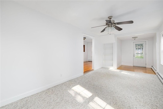 52 Pleasant View Rd, Warwick, RI 02888 - carpeted empty room featuring baseboards, ceiling fan, and built in shelves