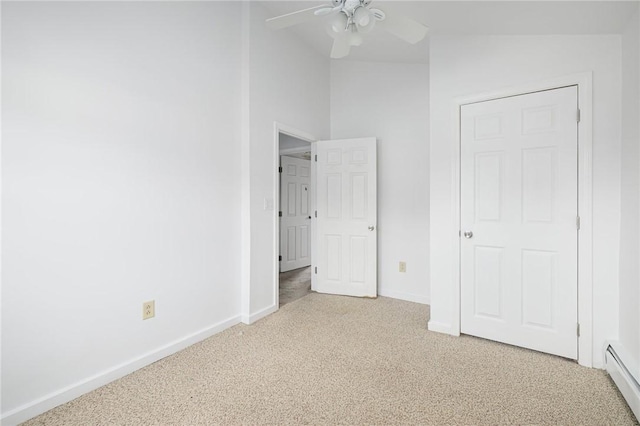 52 Pleasant View Rd, Warwick, RI 02888 - unfurnished bedroom with light carpet, a baseboard heating unit, baseboards, vaulted ceiling, and a ceiling fan