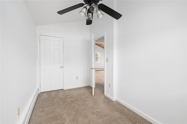 52 Pleasant View Rd, Warwick, RI 02888 - unfurnished bedroom featuring carpet, vaulted ceiling, baseboards, a ceiling fan, and baseboard heating