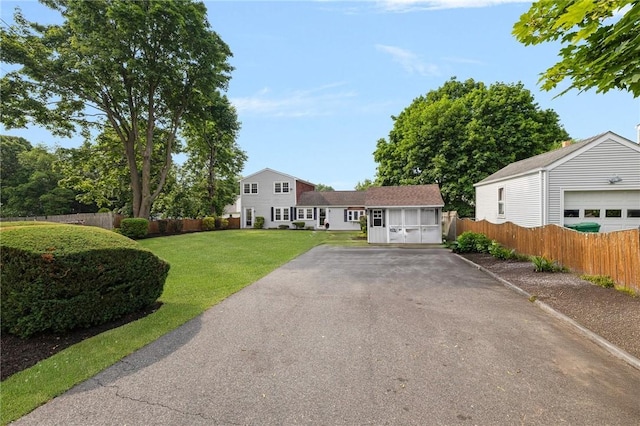 52 Pleasant View Rd, Warwick, RI 02888 - view of front of property featuring asphalt driveway and an outdoor structure