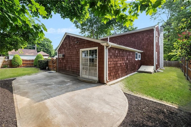 52 Pleasant View Rd, Warwick, RI 02888 - view of property exterior with a patio area and a chimney