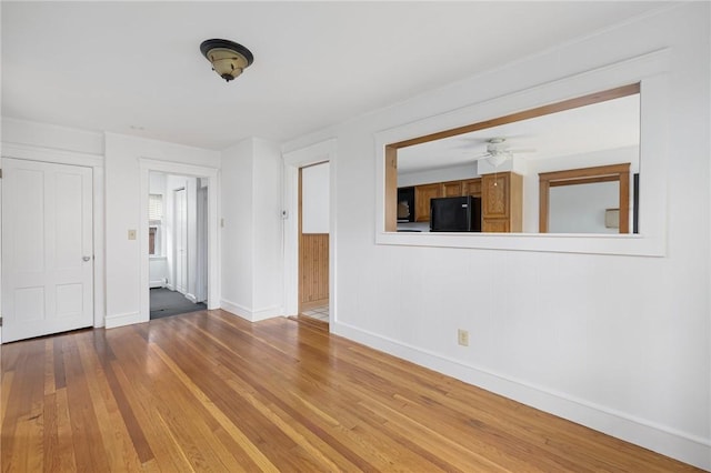 52 Pleasant View Rd, Warwick, RI 02888 - unfurnished room featuring baseboards, wood-type flooring, and a ceiling fan
