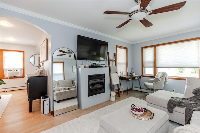 2 Ann St, North Providence, RI 02904 - living room featuring a baseboard radiator, cooling unit, light wood-style floors, ceiling fan, and crown molding