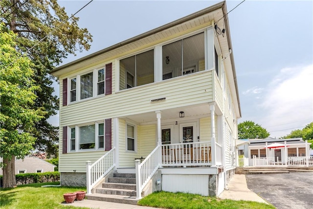 2 Ann St, North Providence, RI 02904 - view of front of home featuring a porch
