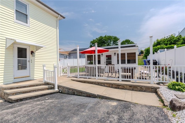 2 Ann St, North Providence, RI 02904 - doorway to property featuring a patio