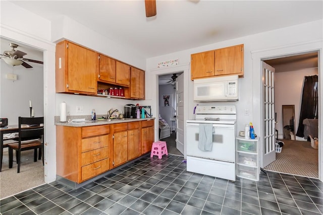 2 Ann St, North Providence, RI 02904 - kitchen with white appliances, a ceiling fan, light countertops, open shelves, and brown cabinetry