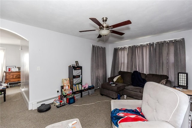 2 Ann St, North Providence, RI 02904 - living area featuring arched walkways, carpet floors, ceiling fan, and baseboard heating
