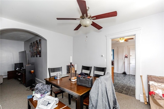 2 Ann St, North Providence, RI 02904 - carpeted dining room featuring arched walkways, a ceiling fan, and a desk