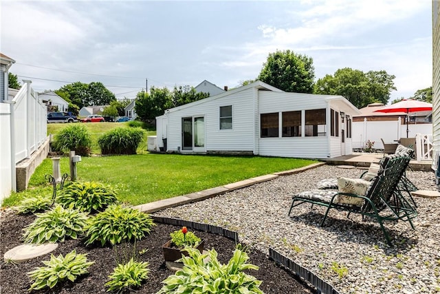 2 Ann St, North Providence, RI 02904 - back of house featuring a patio and a sunroom