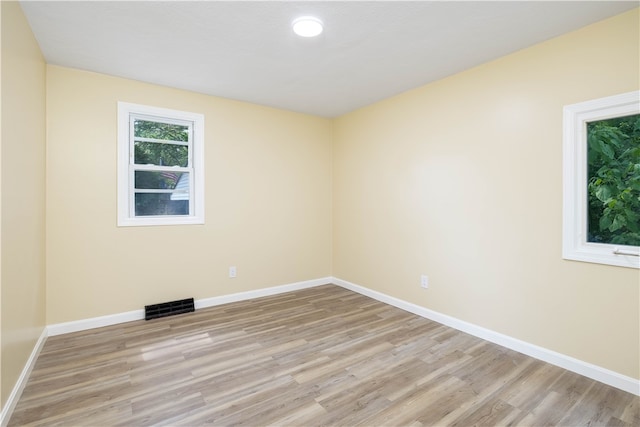 259 Buttonwoods Ave, Warwick, RI 02886 - empty room with light wood finished floors and baseboards