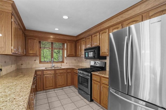 236 Indian Trl, Narragansett, RI 02874 - kitchen featuring appliances with stainless steel finishes, a sink, brown cabinets, backsplash, and recessed lighting