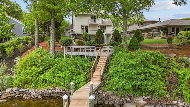 236 Indian Trl, Narragansett, RI 02874 - back of house featuring stairway and stucco siding