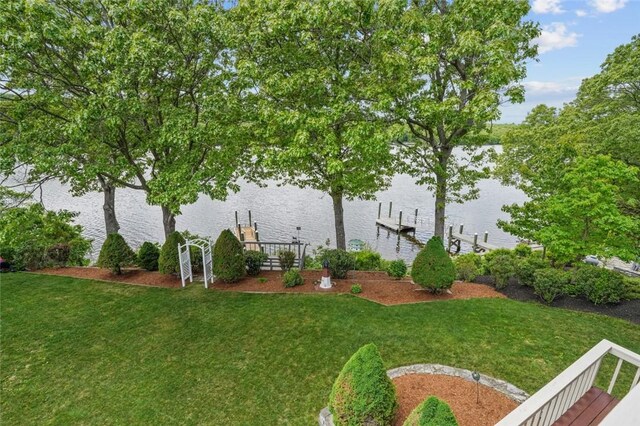 236 Indian Trl, Narragansett, RI 02874 - view of grassy yard featuring a water view and a dock