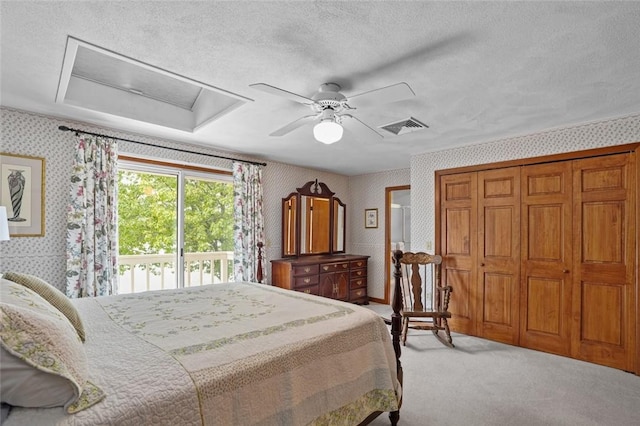 236 Indian Trl, Narragansett, RI 02874 - bedroom with wallpapered walls, carpet floors, attic access, access to outside, and a textured ceiling