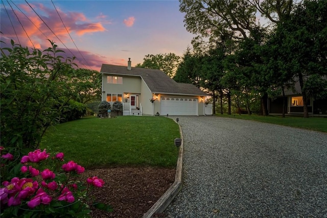 236 Indian Trl, Narragansett, RI 02874 - view of front of house with a garage, driveway, a yard, and stucco siding