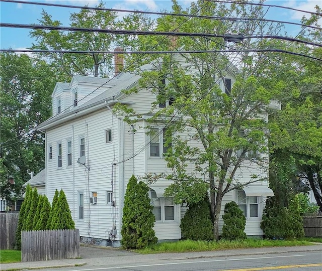 263 Front St, Lincoln, RI 02865 - view of property exterior featuring a chimney
