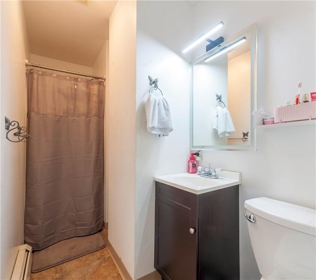 263 Front St, Lincoln, RI 02865 - bathroom with a baseboard radiator, vanity, and toilet