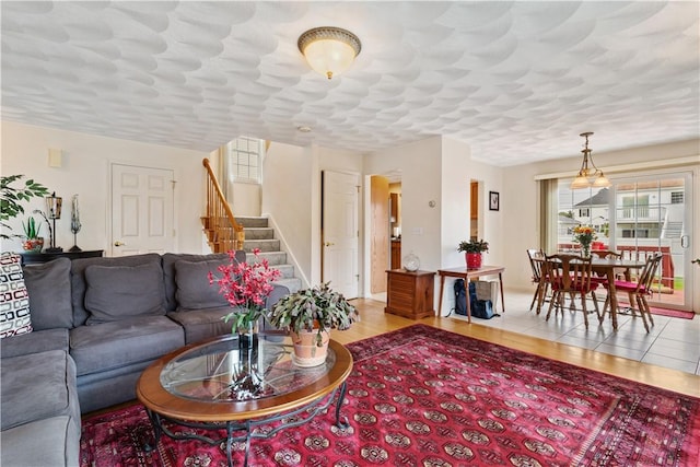 53 Hyde Ave, Pawtucket, RI 02861 - living room with wood finished floors and stairs