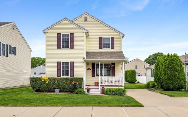 53 Hyde Ave, Pawtucket, RI 02861 - traditional home featuring covered porch and a front lawn