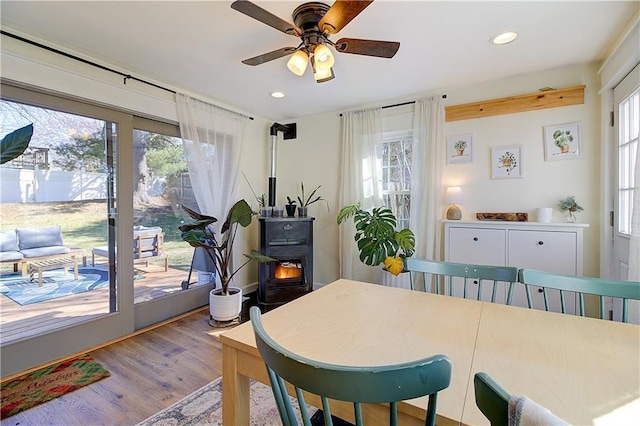 80 Barrett Ave, North Providence, RI 02904 - dining space featuring wood finished floors, a ceiling fan, recessed lighting, and a wood stove
