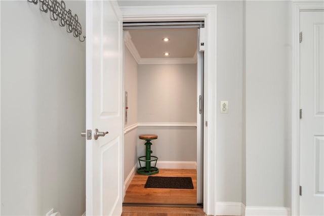 40 Kettle Point Ave, East Providence, RI 02914 - corridor with ornamental molding, wood finished floors, and recessed lighting