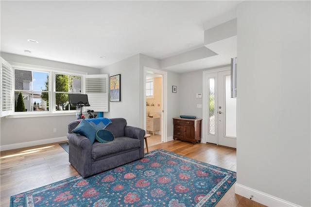 40 Kettle Point Ave, East Providence, RI 02914 - living area with baseboards and wood finished floors