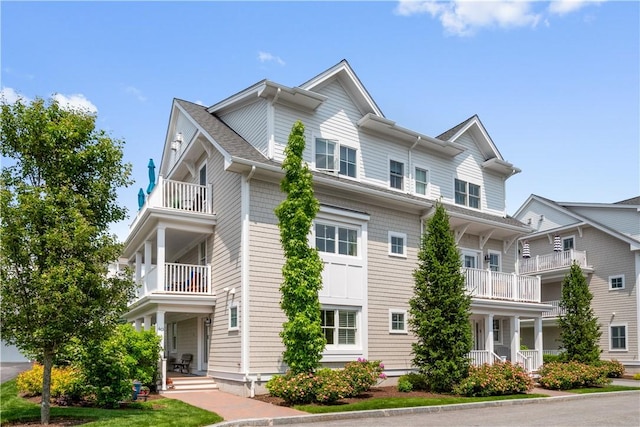 40 Kettle Point Ave, East Providence, RI 02914 - view of front facade featuring a balcony and covered porch