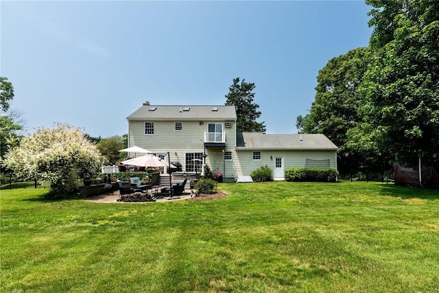 59 Intrepid Ln, Jamestown, RI 02835 - rear view of house with a patio area