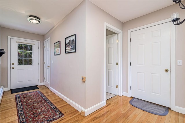 59 Intrepid Ln, Jamestown, RI 02835 - foyer entrance featuring light wood finished floors and baseboards