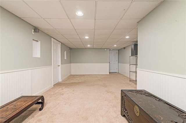 59 Intrepid Ln, Jamestown, RI 02835 - finished basement with a wainscoted wall, recessed lighting, a drop ceiling, and light carpet